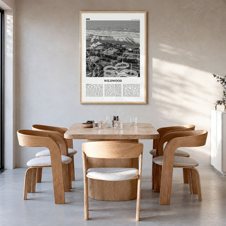 Wildwood Newspaper Poster in a natural wood frame, hanging in a dining room