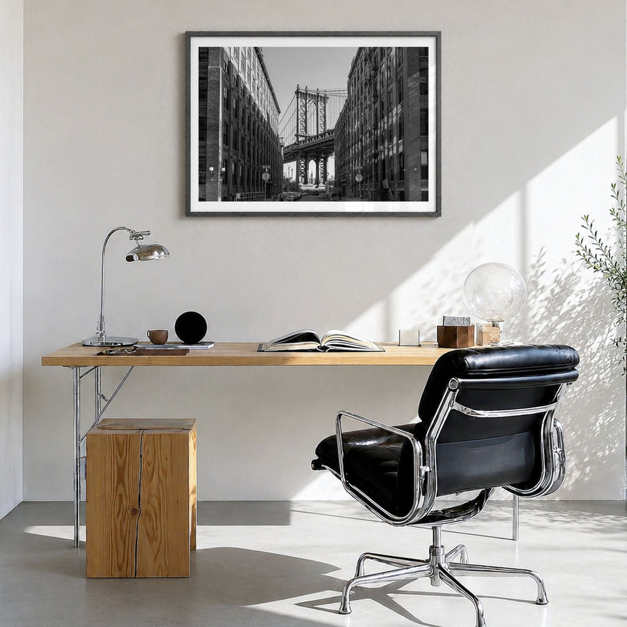 Williamsburg, New York Photo Poster in a black wood frame, hanging in a bright home office, white border