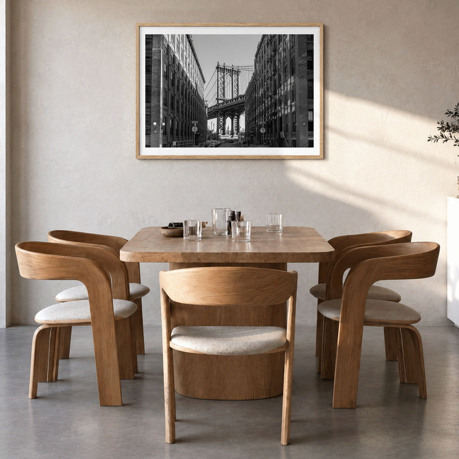 Williamsburg, New York Photo Poster in a natural wood frame, hanging in a dining room, white border