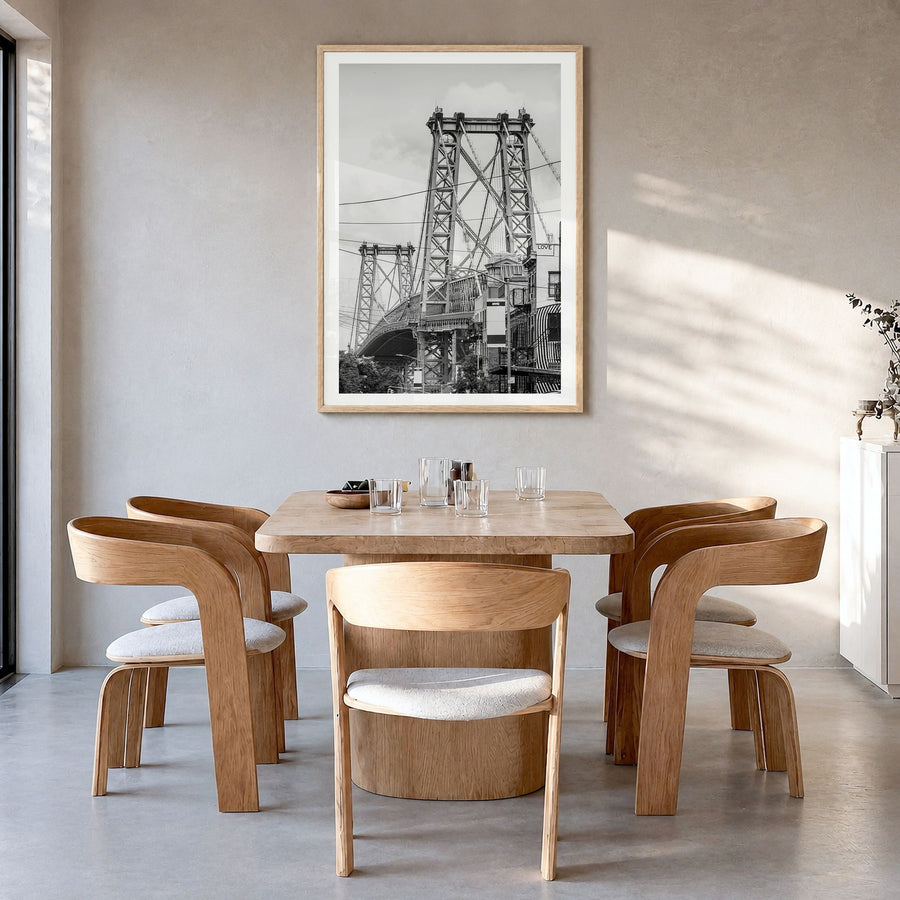 Williamsburg, New York Photo Poster in a natural wood frame, hanging in a dining room, white border