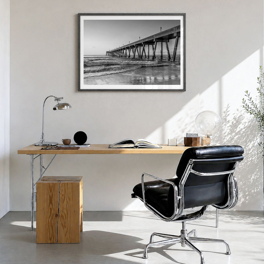 Wilmington, North Carolina Photo Poster in a black wood frame, hanging in a bright home office, white border