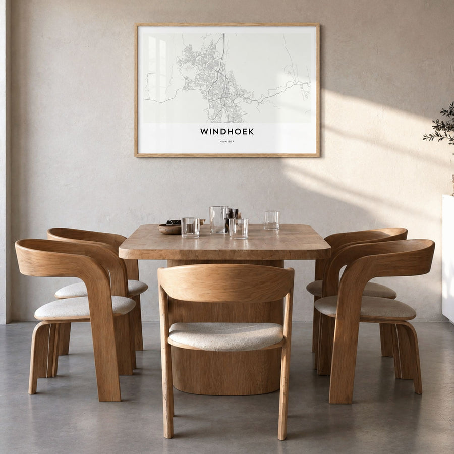 Windhoek Map Poster in a natural wood frame, hanging in a dining room