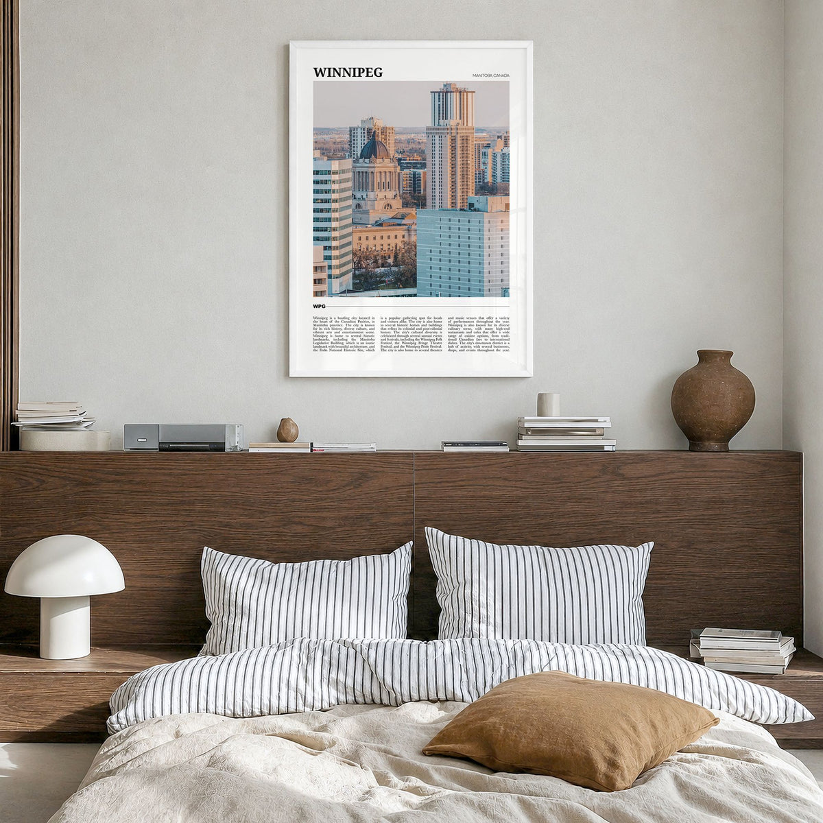 Winnipeg Travel No 2 Poster in a white wood frame, hanging in a bedroom