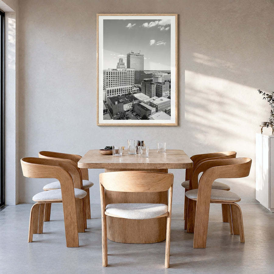 Winston-Salem Photo Poster in a natural wood frame, hanging in a dining room, white border