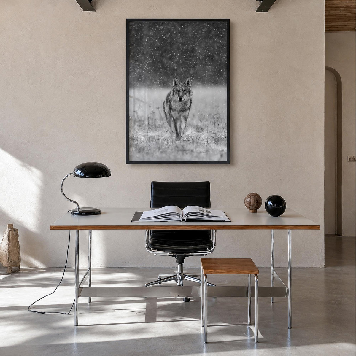 Wolf black & white photo poster – vertical wall art in black wood frame, hanging on wall