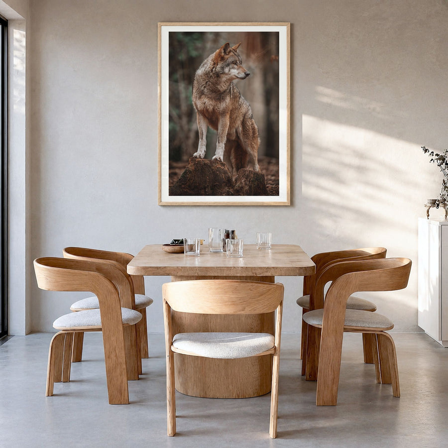 Wolf Photo No 1 Poster in a natural wood frame, hanging in a dining room, white border