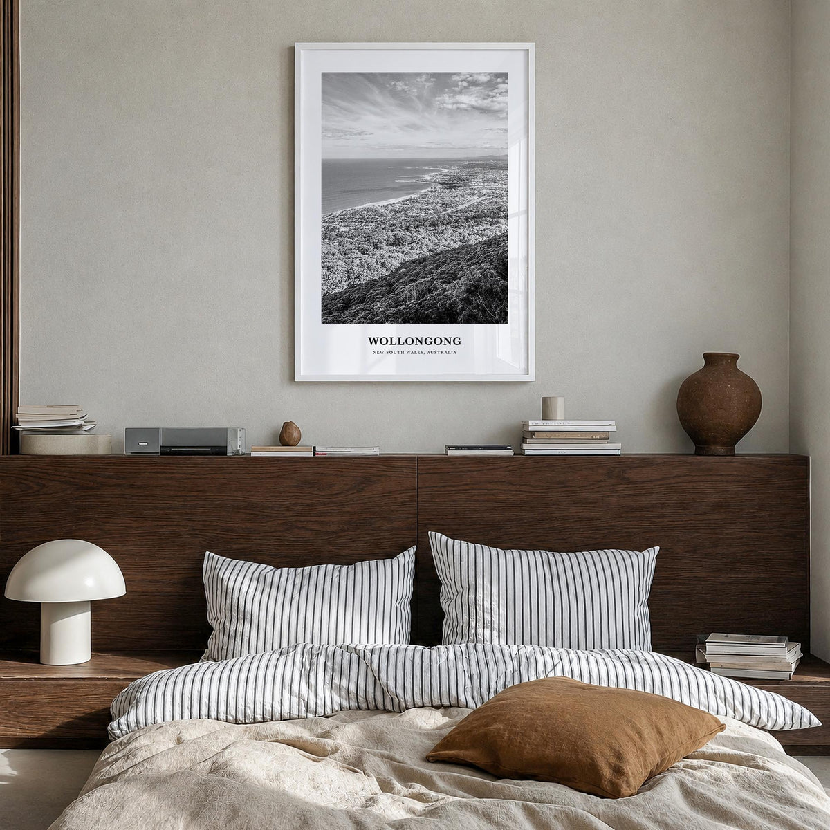 Wollongong black & white classic poster of New South Wales, Australia – vertical wall art in white wood frame, hanging on wal
