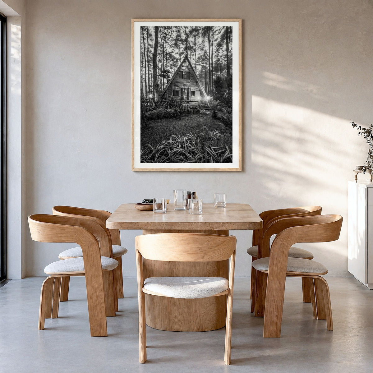 Wooden Cabin Logs Photo No 2 Poster in a natural wood frame, hanging in a dining room, white border