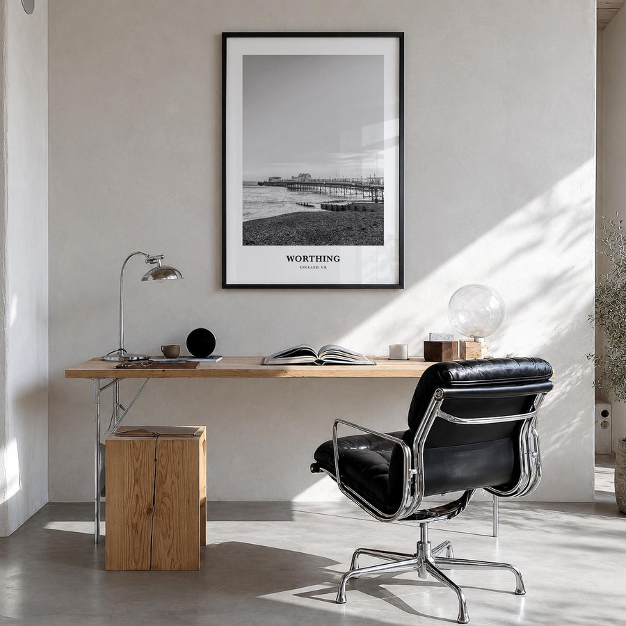 Worthing black & white classic poster of United Kingdom – vertical wall art in black wood frame, hanging on wall