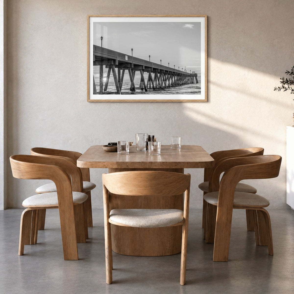 Wrightsville Beach Photo Poster in a natural wood frame, hanging in a dining room, white border