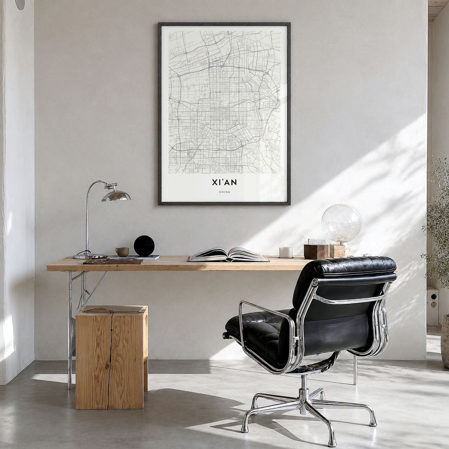 Xi'an Map Poster in a black wood frame, hanging in a bright home office