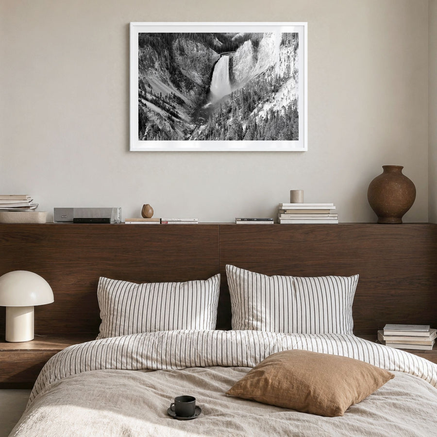 Yellowstone National Park Photo Poster in a white wood frame, hanging in a bedroom, white border
