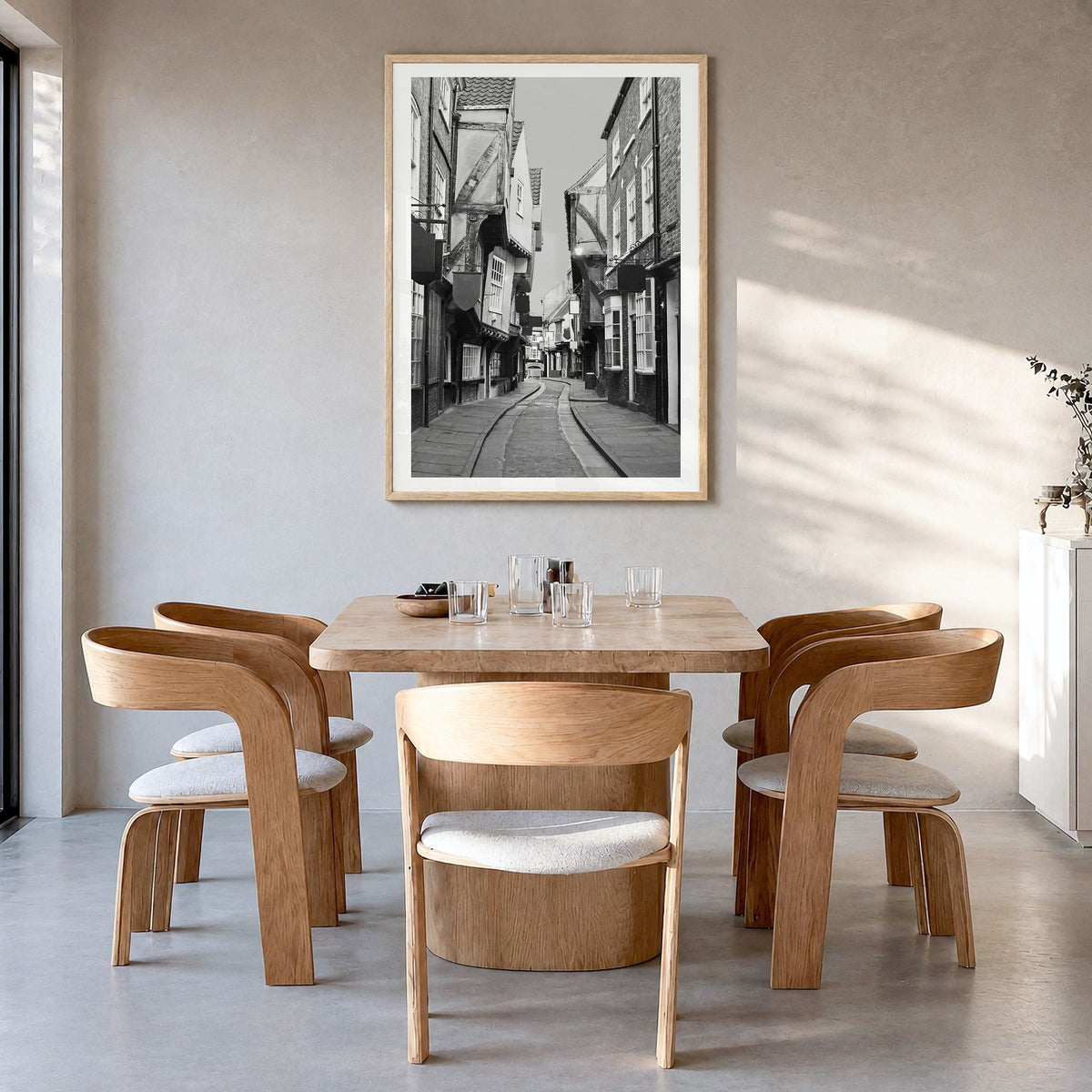 York, England Photo Poster in a natural wood frame, hanging in a dining room, white border