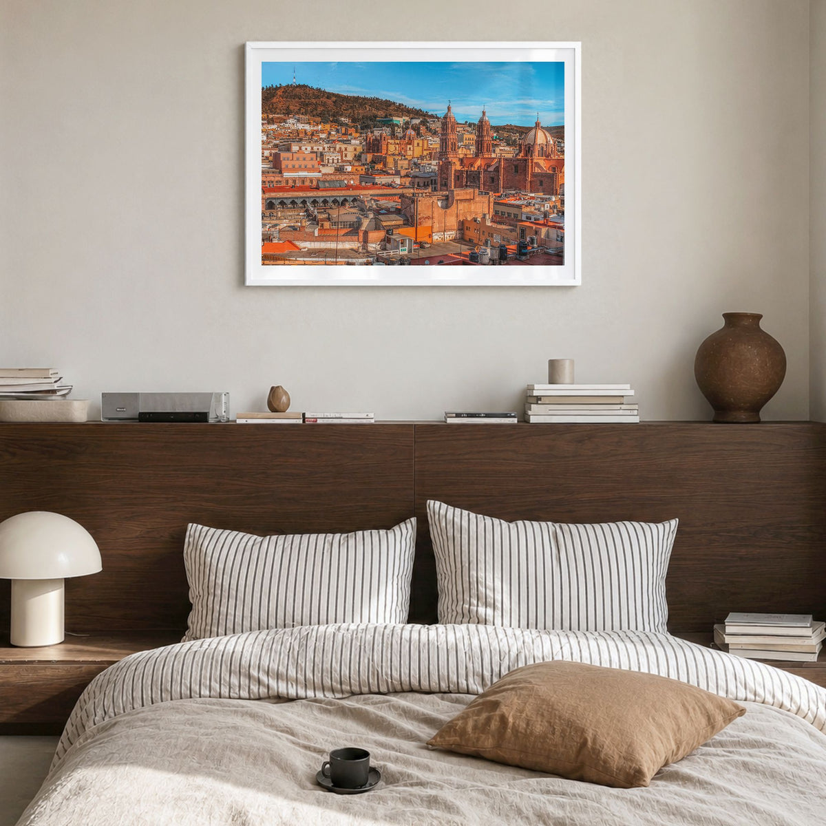 Zacatecas Photo Poster in a white wood frame, hanging in a bedroom, white border