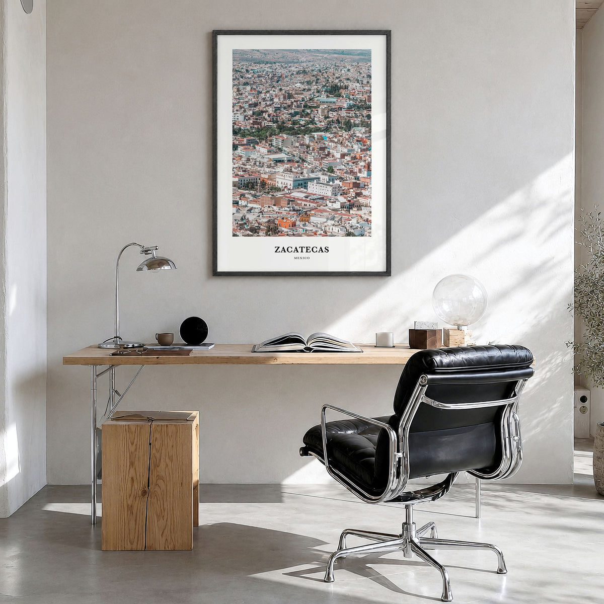 Zacatecas Classic Poster in a black wood frame, hanging in a bright home office