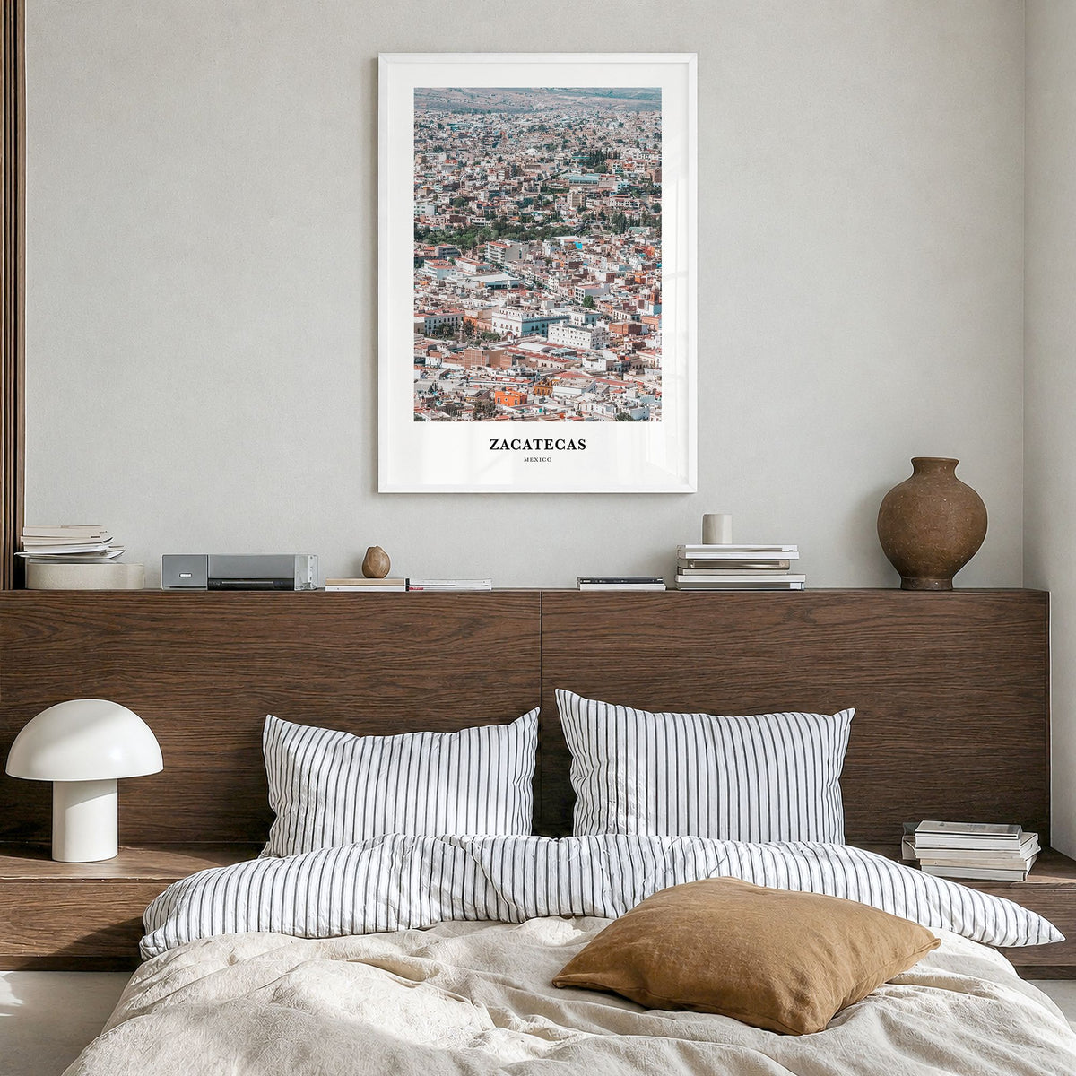 Zacatecas Classic Poster in a white wood frame, hanging in a bedroom
