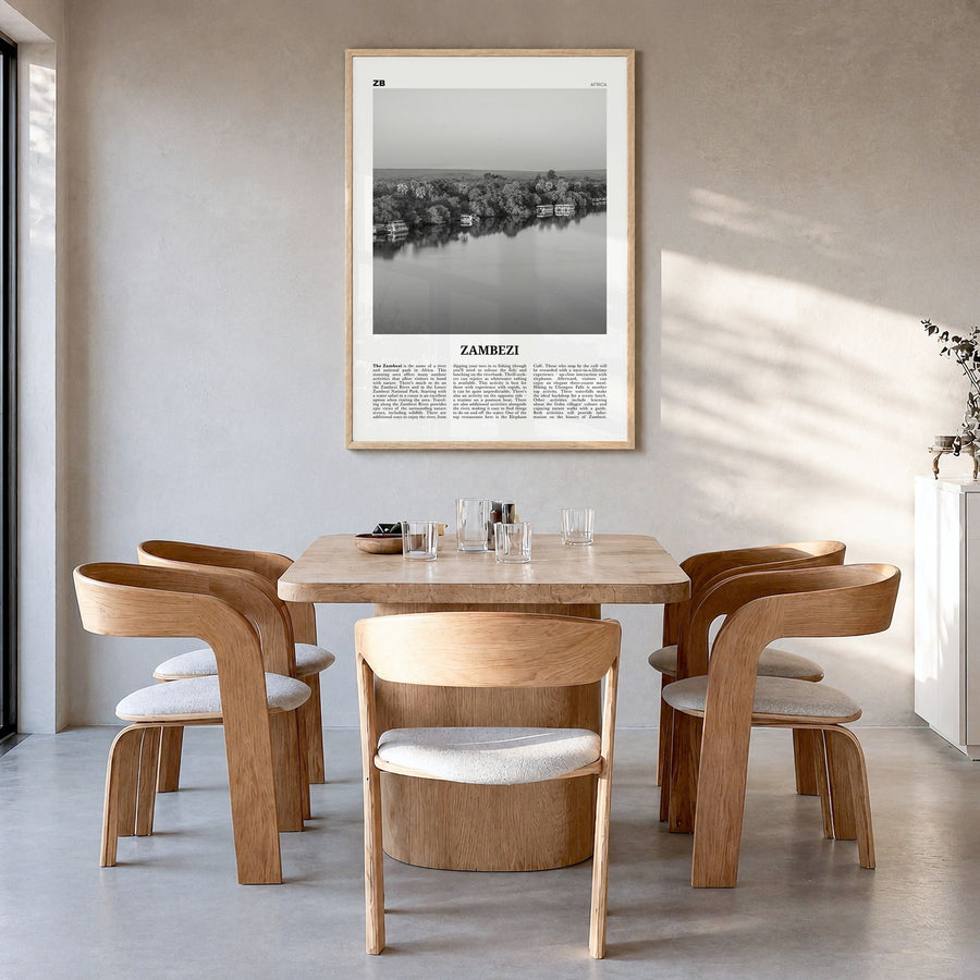 Zambezi Newspaper Poster in a natural wood frame, hanging in a dining room