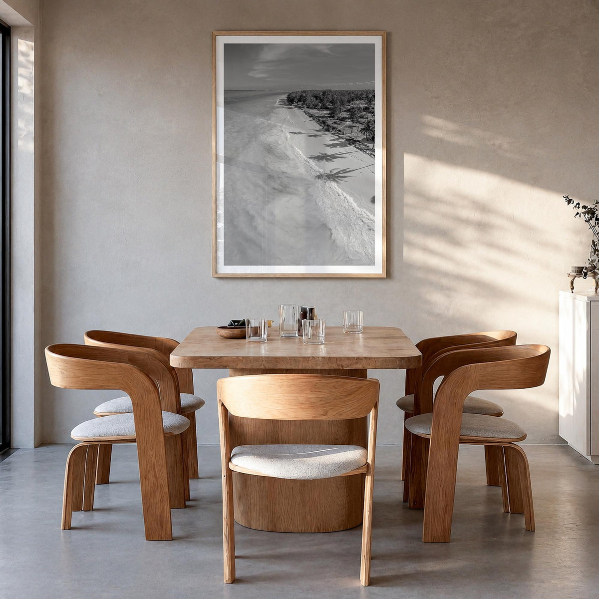 Zanzibar black & white photo poster of Tanzania – vertical wall art in natural wood frame with white border, hanging on wall