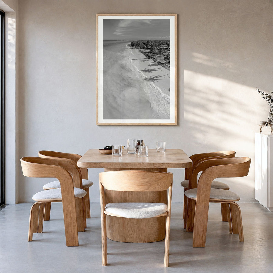 Zanzibar Photo Poster in a natural wood frame, hanging in a dining room, white border