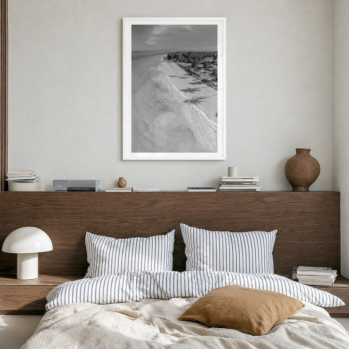 Zanzibar Photo Poster in a white wood frame, hanging in a bedroom, white border
