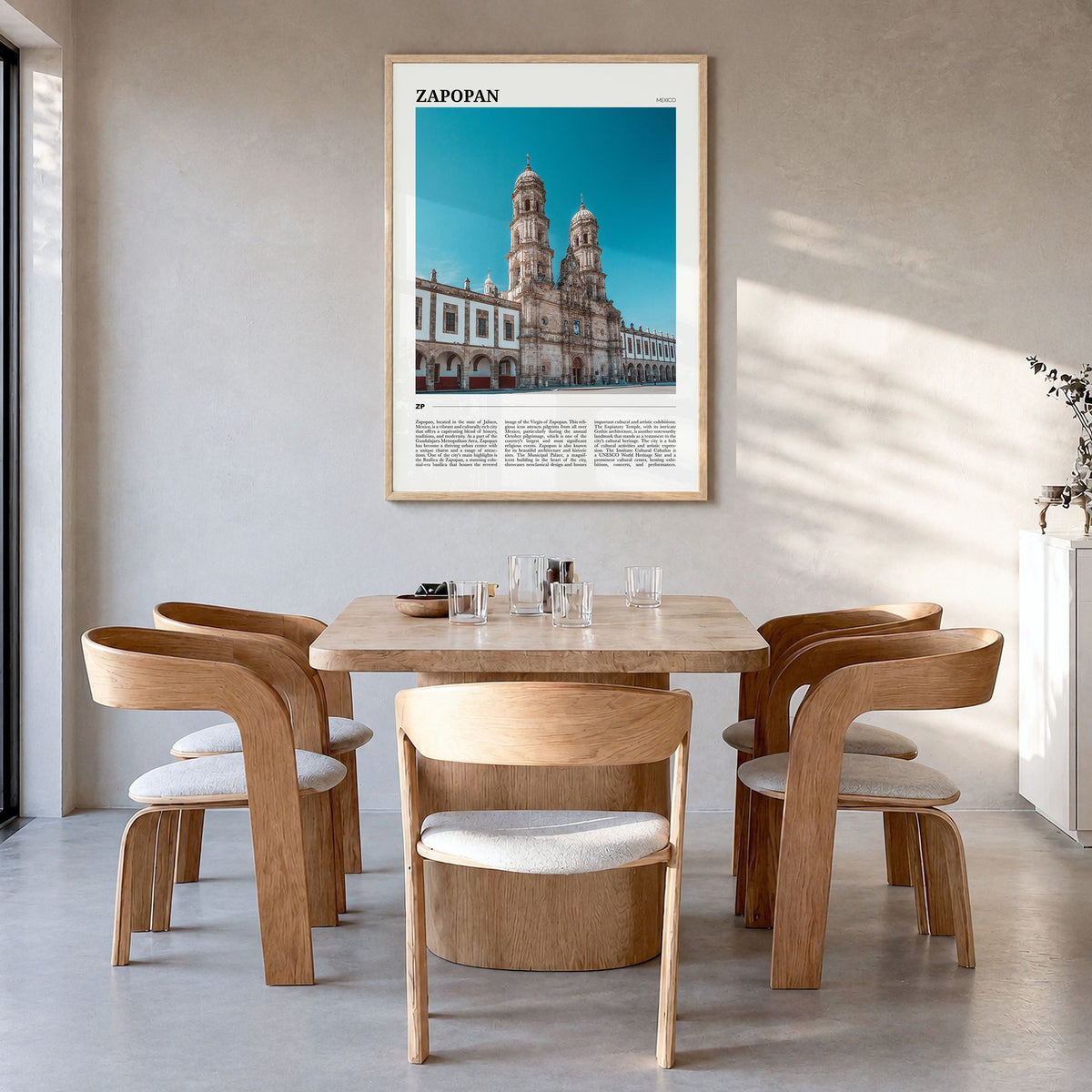 Zapopan Travel Poster in a natural wood frame, hanging in a dining room