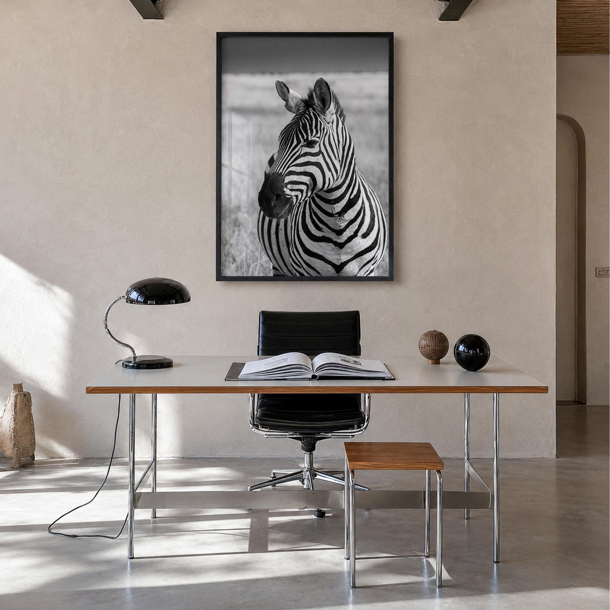 Zebra no. 1 black & white photo poster – vertical wall art in black wood frame, hanging on wall