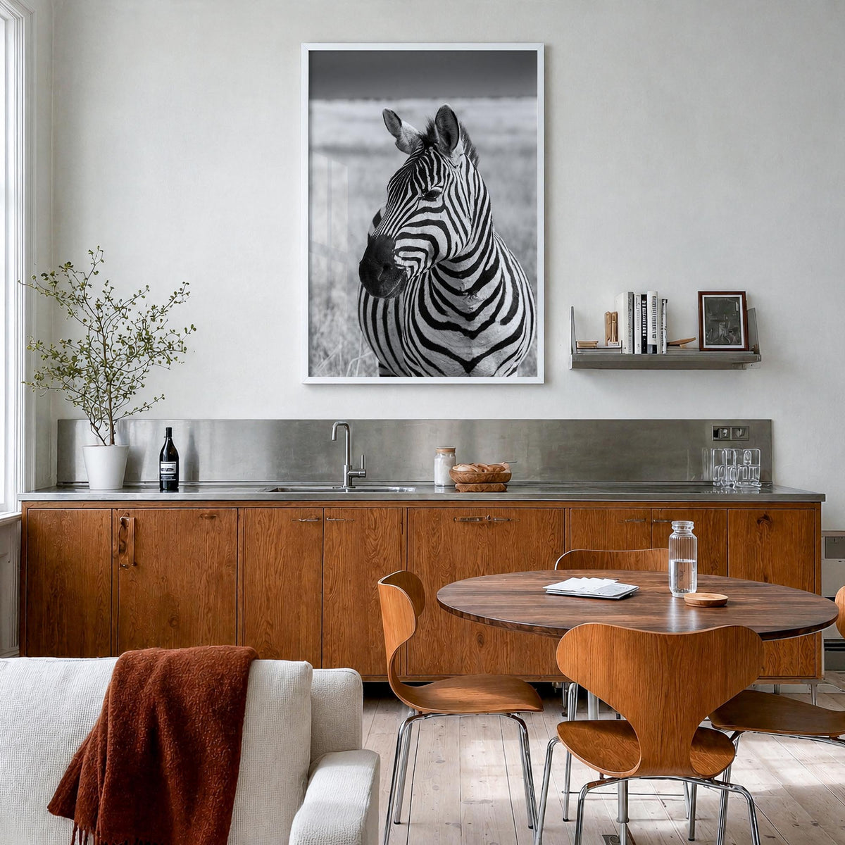 Zebra no. 1 black & white photo poster – vertical wall art in white wood frame, hanging on wall