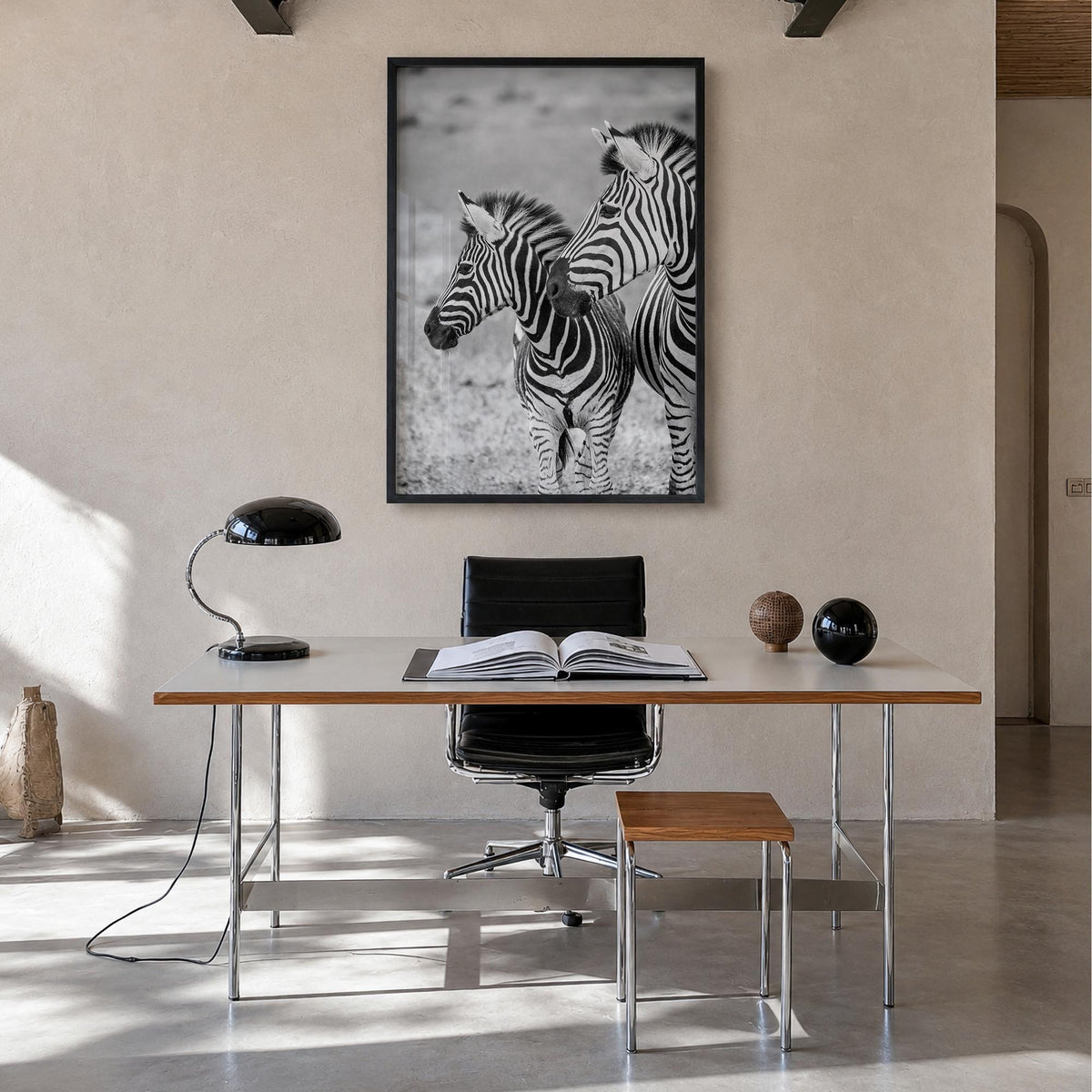 Zebra no. 2 black & white photo poster – vertical wall art in black wood frame, hanging on wall