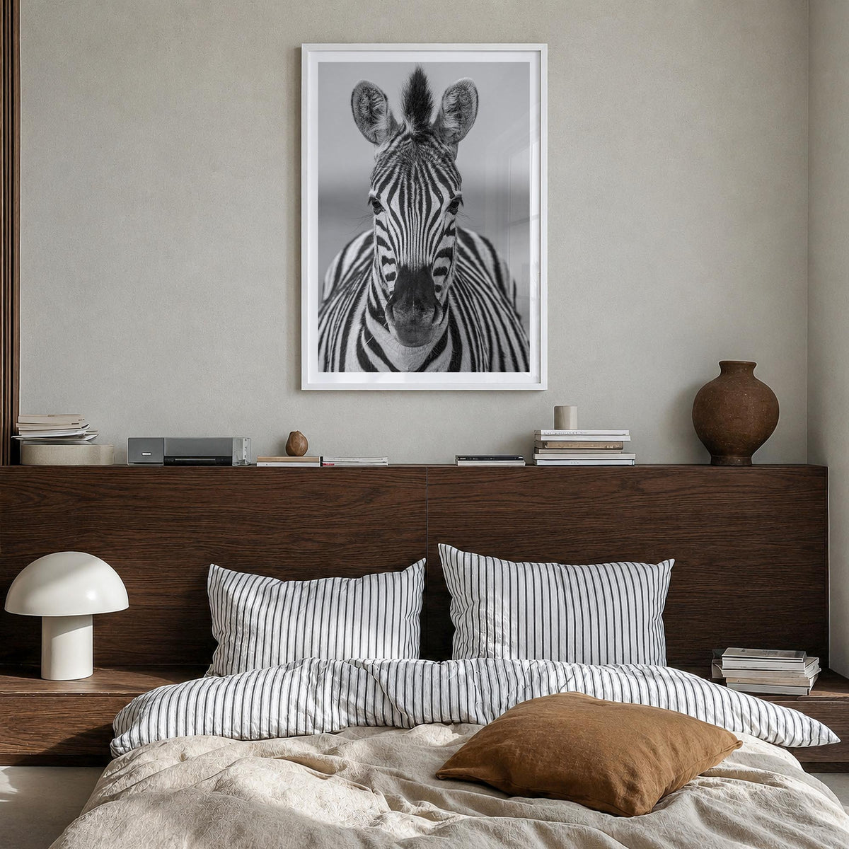 Zebra no. 3 black & white photo poster – vertical wall art in white wood frame with white border, hanging on wall
