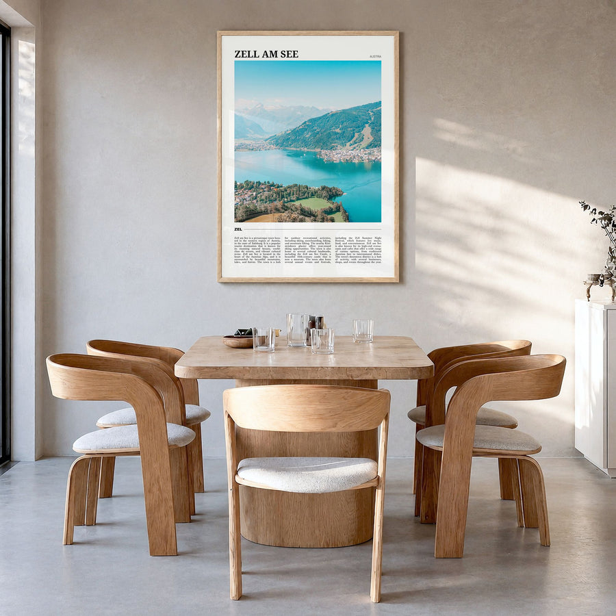 Zell am See Travel Poster in a natural wood frame, hanging in a dining room