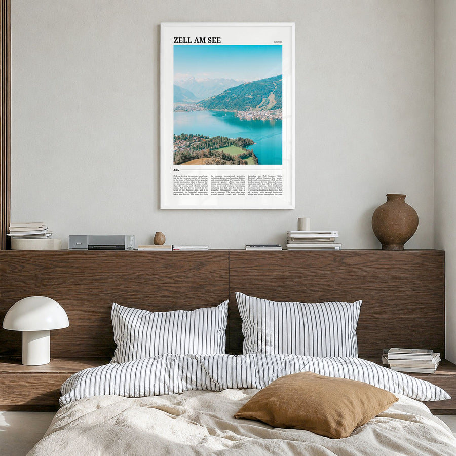 Zell am See Travel Poster in a white wood frame, hanging in a bedroom