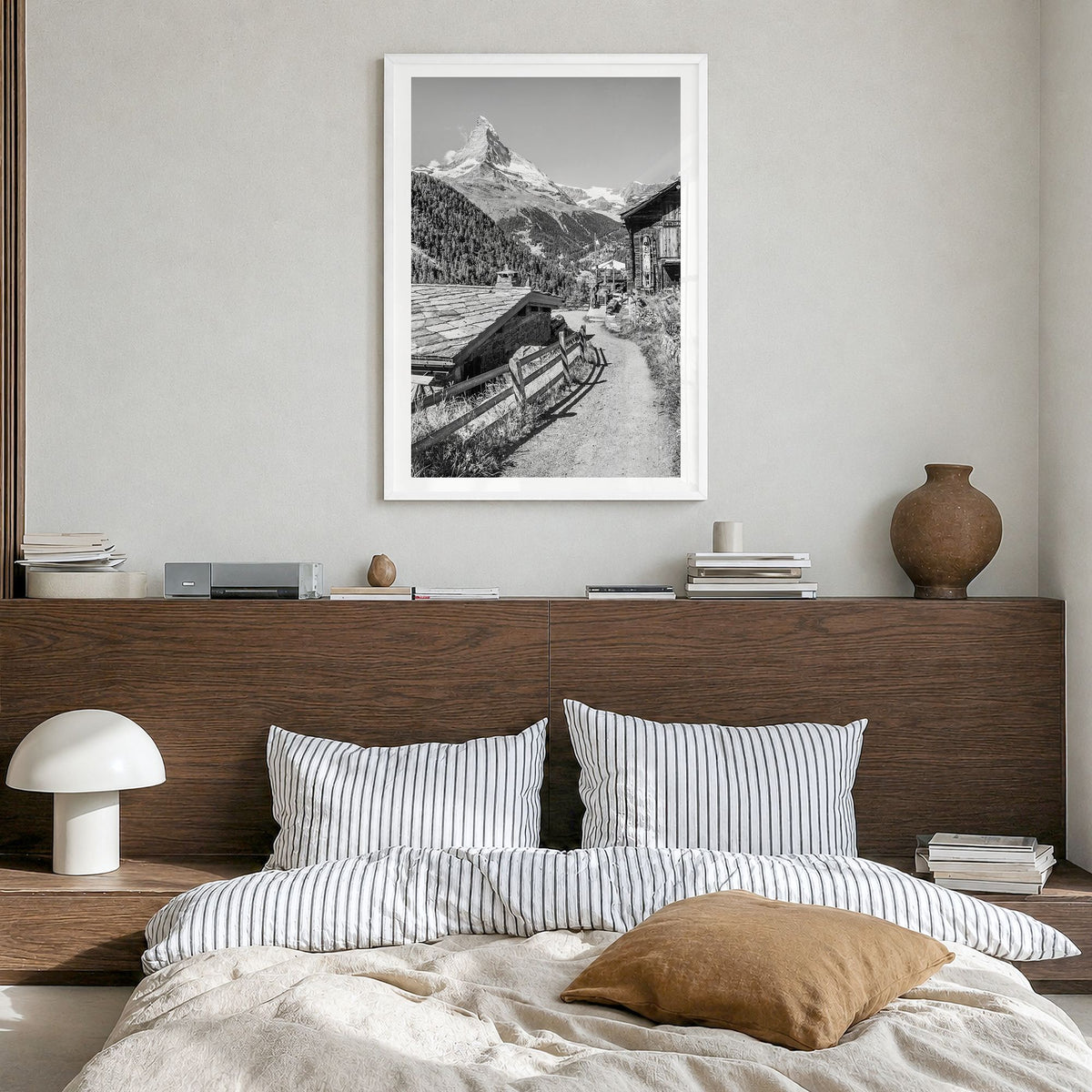 Zermatt Photo Poster in a white wood frame, hanging in a bedroom, white border