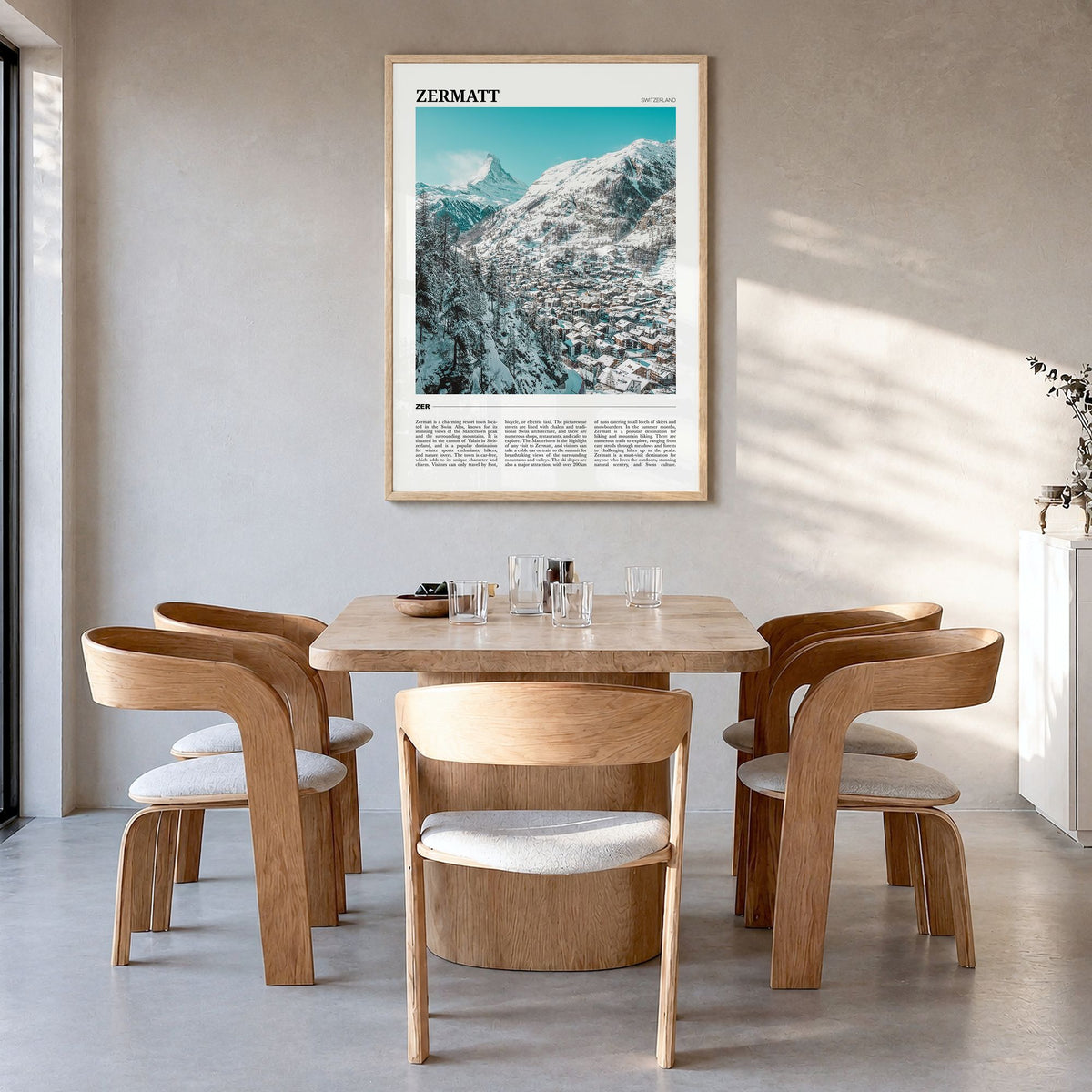 Zermatt Travel Poster in a natural wood frame, hanging in a dining room