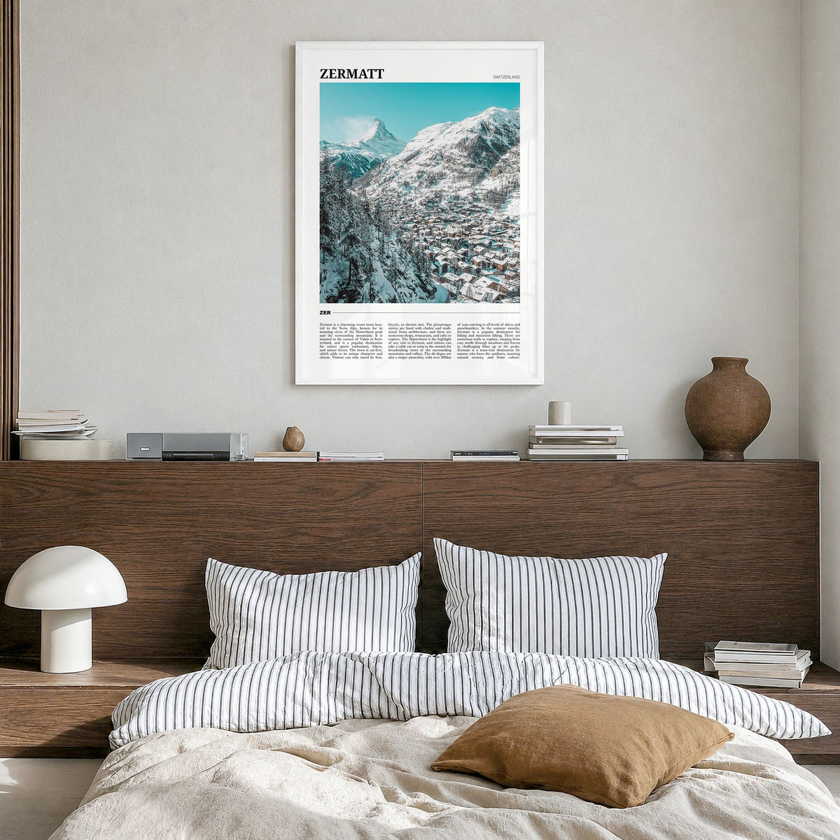 Zermatt Travel Poster in a white wood frame, hanging in a bedroom