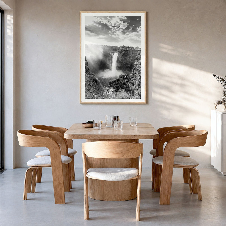 Zimbabwe Photo Poster in a natural wood frame, hanging in a dining room, white border