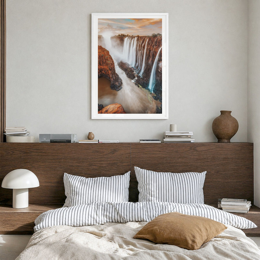 Zimbabwe Photo Poster in a white wood frame, hanging in a bedroom, white border