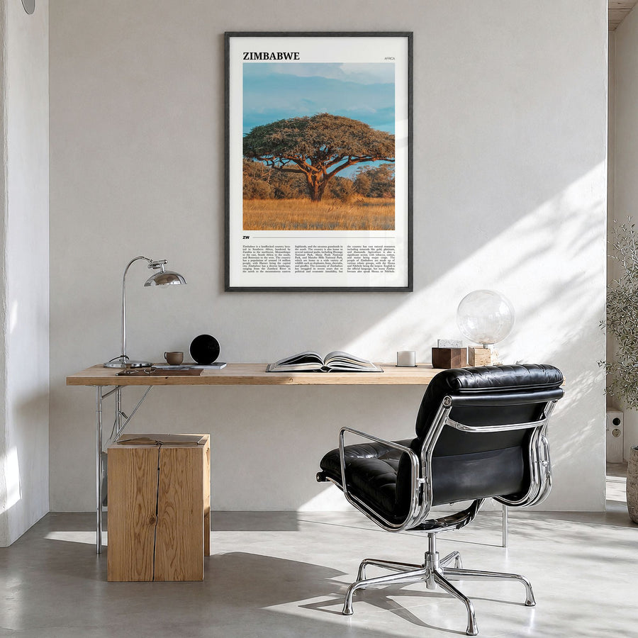 Zimbabwe Travel Poster in a black wood frame, hanging in a bright home office