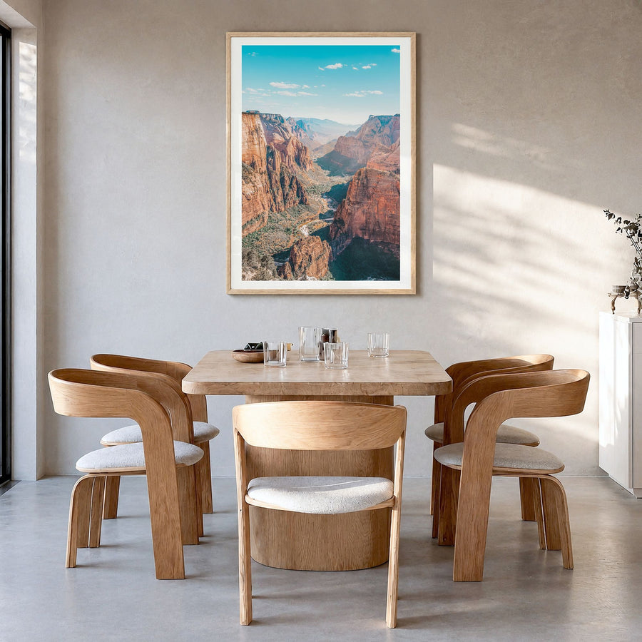 Zion National Park Photo Poster in a natural wood frame, hanging in a dining room, white border